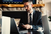 man working on laptop at desk